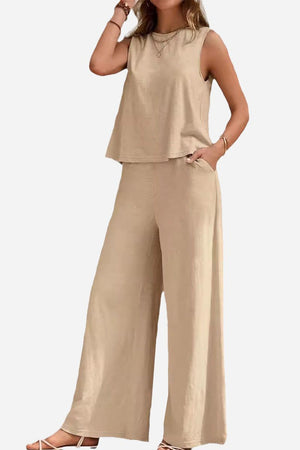 Beige sleeveless wide leg pants set with relaxed fit and soft, wrinkle-resistant fabric.