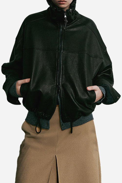 Black authentic sheepskin leather jacket with zipper and high collar, styled for mature fit and lasting durability.
