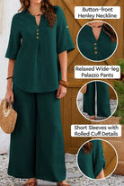 Wrinkle-free wide leg palazzo pants and button-front top set with short sleeves and rolled cuff details in dark green