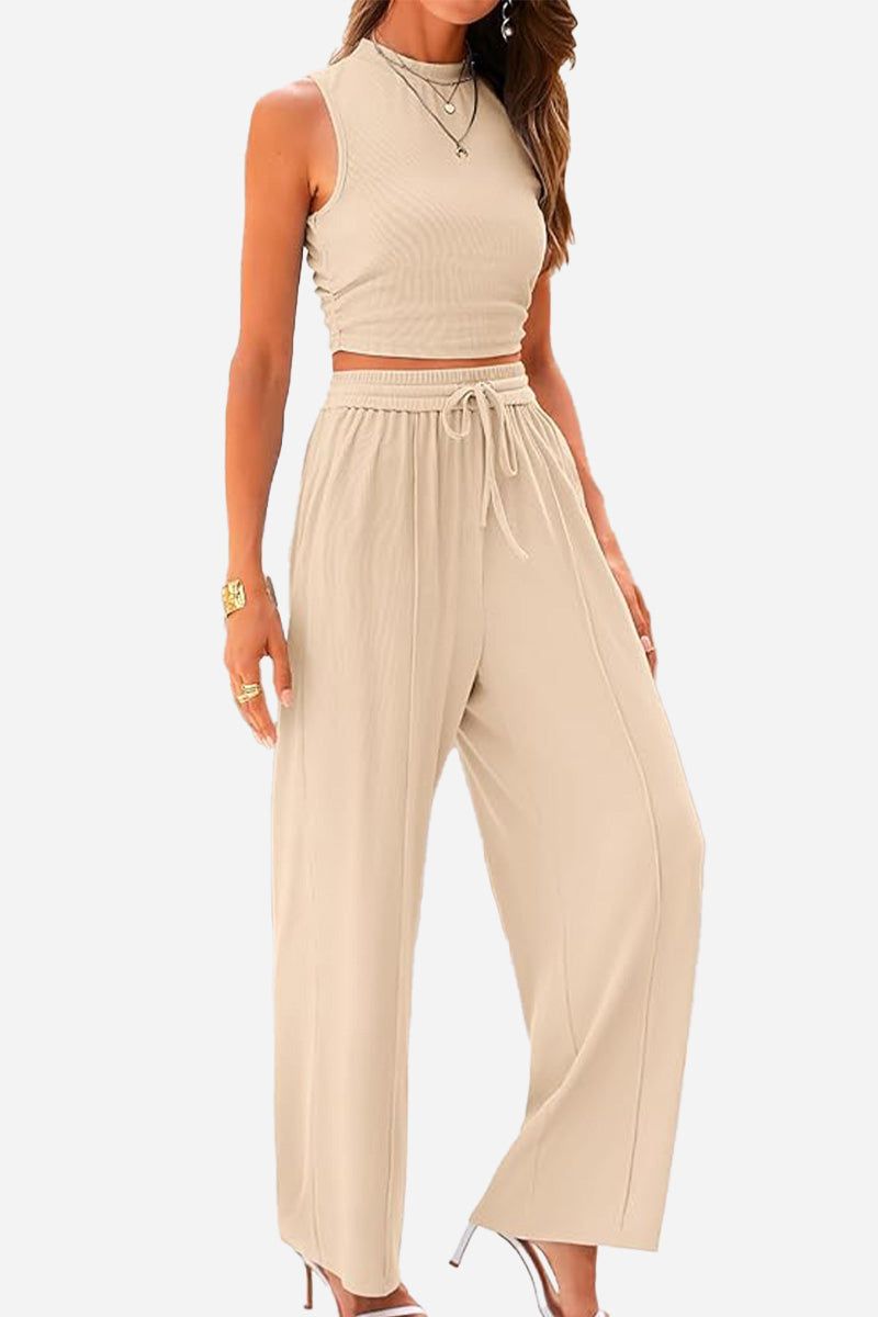 Beige ribbed knit sleeveless crop top and wide-leg pants two-piece set with drawstring waistband.