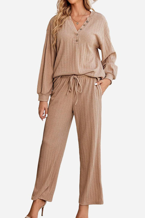 Woman wearing beige Desert Bloom Ribbed Comfort Set with long sleeves and wide-leg pants.
