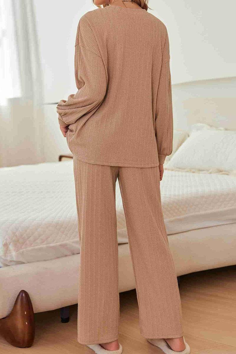Woman wearing Desert Bloom Ribbed Comfort Set in soft ribbed fabric with relaxed fit and wide-leg pants in beige tone