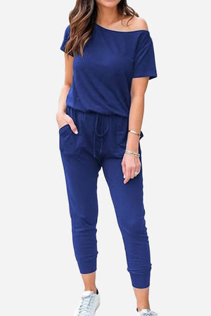 Moonlit Rome Off-Shoulder Jumpsuit in navy blue with comfortable fit and functional pockets