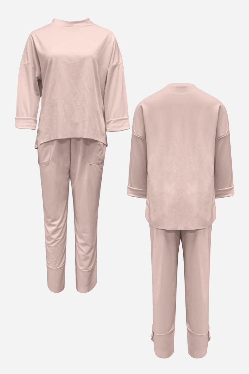 Minimalist light pink two-piece set with crew neck sweatshirt and jogger pants for casual comfort