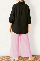 Oversized Linen Leaved-IN Set with black oversized linen-blend shirt and pink flowy palazzo pants for relaxed summer style