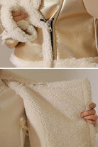Cropped faux leather jacket with soft cream sherpa lining and trim, zipper front, warm and wind-resistant for everyday wear