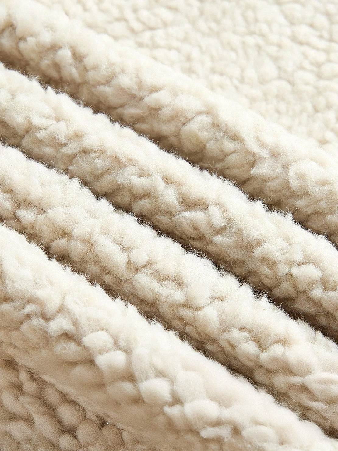 Faux suede sherpa coat with contrast trim and side pockets for transitional weather