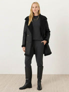 Women's mid-thigh faux suede sherpa coat with contrast trim and side pockets
