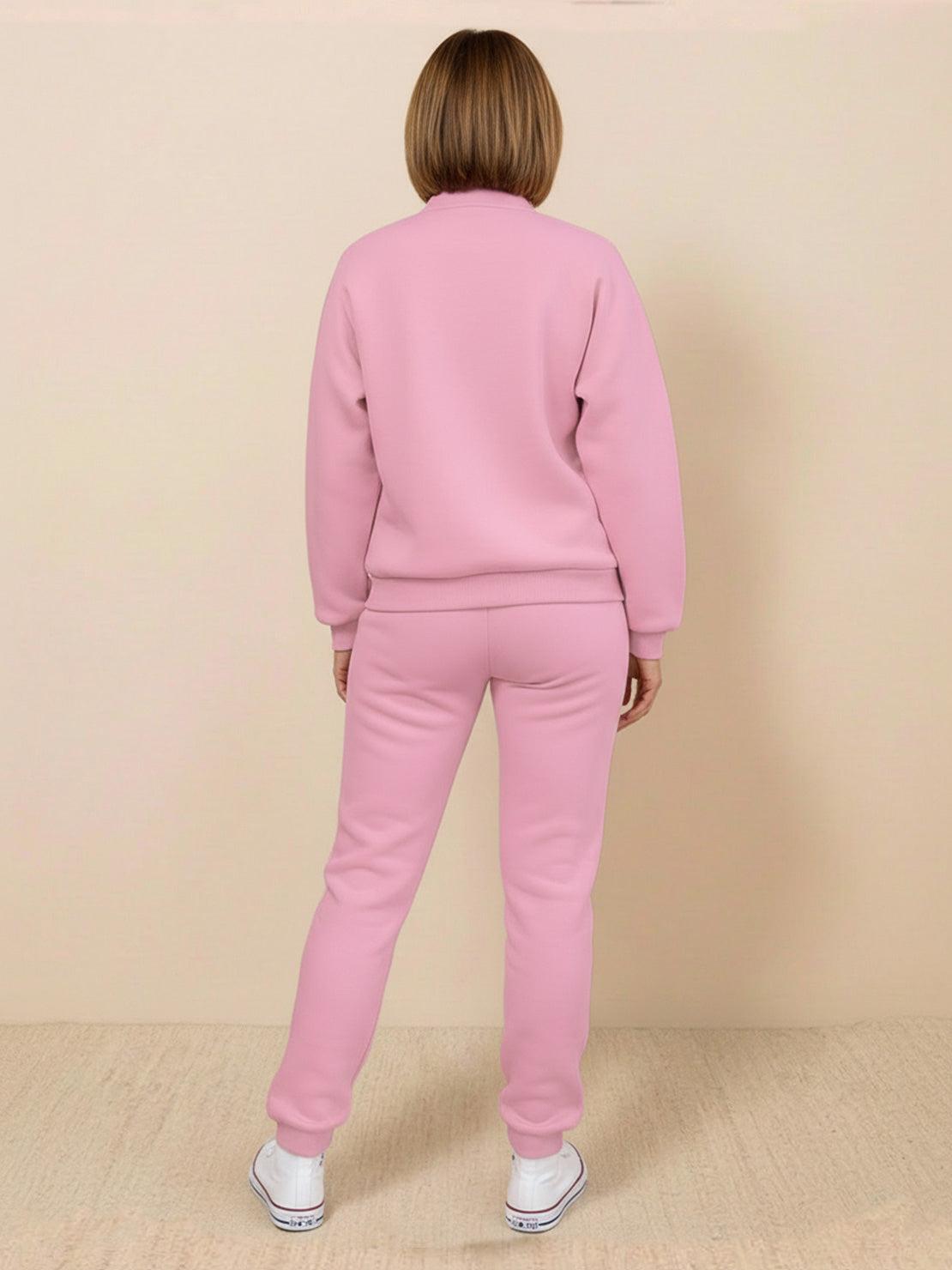 Woman wearing a colorblock comfort tracksuit with contrast curved panels and relaxed fit
