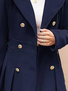 Tailored fit and flare trench coat with double-breasted buttons and smooth lining