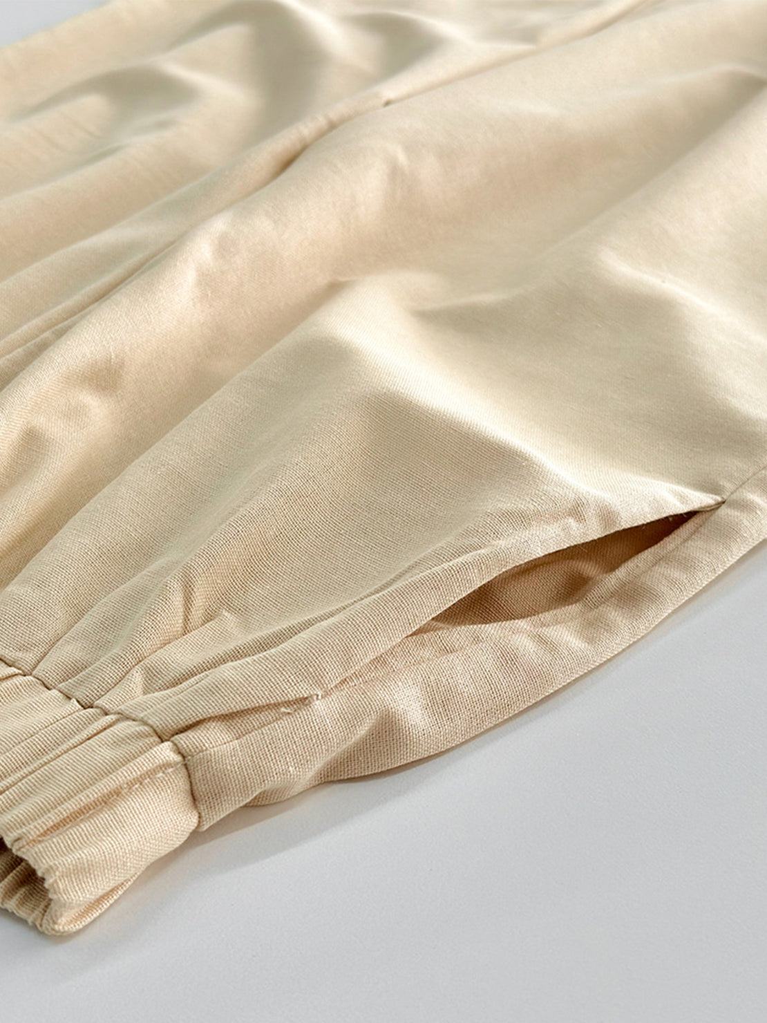 Lightweight linen-blend set with sleeveless top and wide-leg pants featuring elastic waistband and side slits for breathability