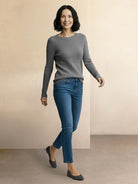 Lightweight 100% cashmere round neck pullover with long sleeves and hip-length cut for versatile styling
