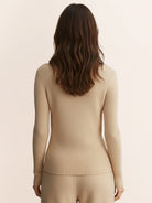 lightweight 100% cashmere round neck pullover sweater with long sleeves and hip-length cut