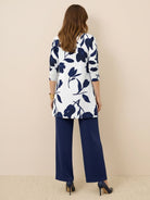 Open-front three-piece co-ord with longline cardigan, tank top, and wide-leg trousers in lightweight knit fabric