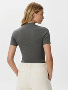 Slim fit short-sleeve mock neck tee made from 100% ultra-fine Merino wool, breathable and wrinkle-resistant