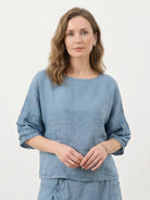 100% cotton two-piece wrap skirt and hip-length top set with crinkle texture and elastic waistband