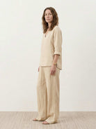 100% cotton linen set with V-neck top and wide-leg elastic waist pants