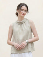 100% linen sleeveless cowl-collar top with boxy silhouette and natural crinkle texture