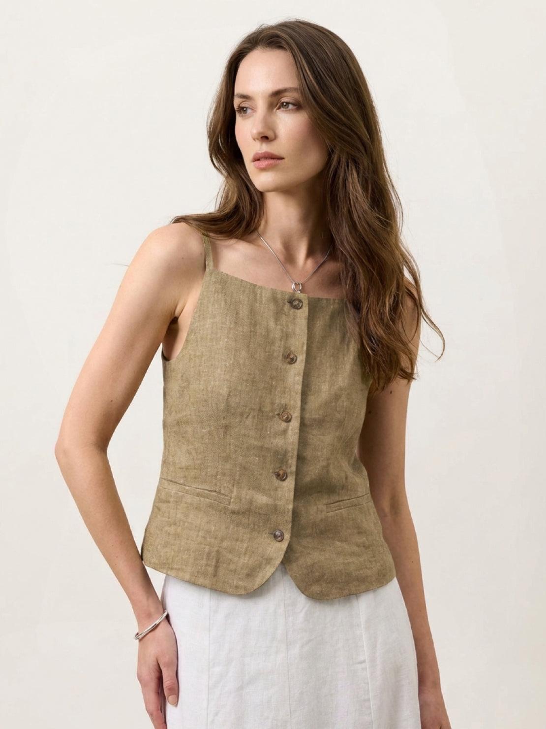 100% linen yarn-dyed vest with square neckline, full button-front, and welt pockets in breathable textured fabric
