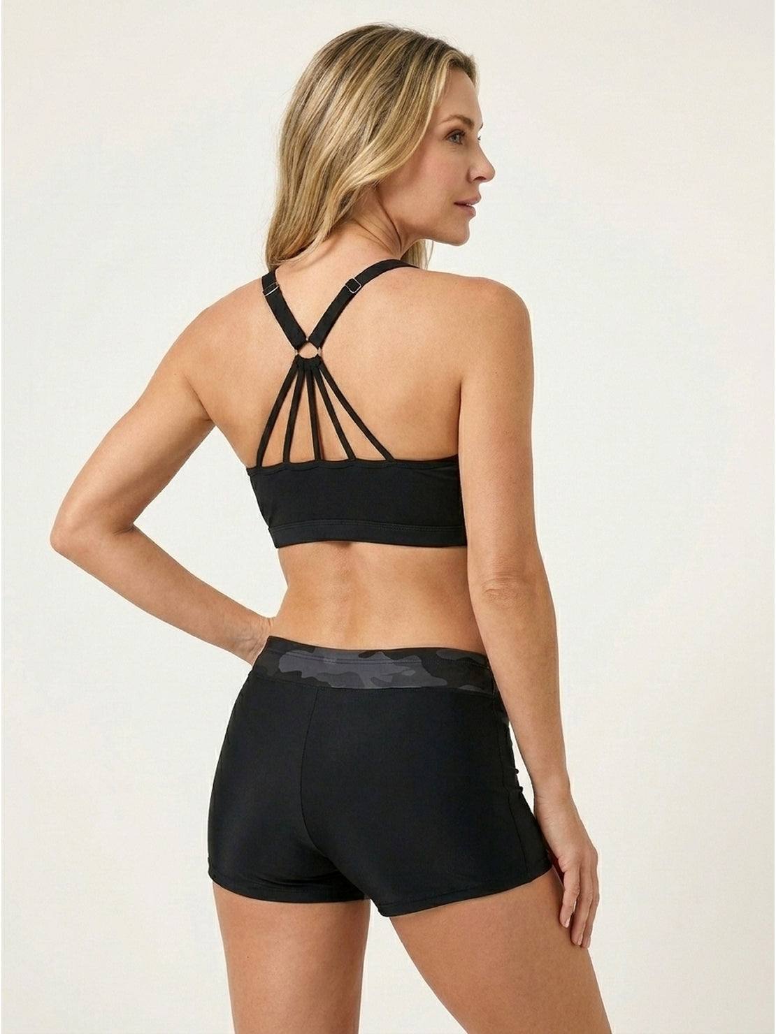 Three-piece open-back swim set with loose tank, printed racerback crop bra, and mid-rise boy shorts