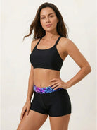 Three-piece open-back swim set with loose scoop-neck tank, printed racerback crop bra, and mid-rise boy shorts