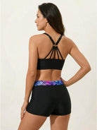 Three-piece open-back swim set with loose scoop-neck tank, racerback crop bra, and mid-rise boy shorts