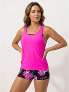 Three-piece open-back swim set with loose tank, printed racerback crop bra, and mid-rise boy shorts