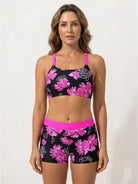 Three-piece open-back swim set with loose tank, racerback crop bra, and mid-rise boy shorts