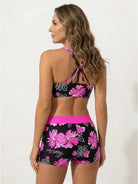Three-piece open-back swim set with loose scoop-neck tank, printed racerback crop bra, and mid-rise boy shorts