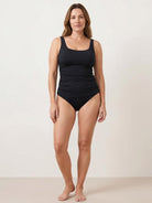 Adjustable ruched black tankini set with wide straps and classic bikini bottoms