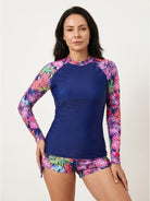 Tropical print rash guard set with long sleeves and matching boy-cut swim shorts