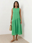 Cotton-linen summer midi dress with tiered skirt and relaxed drop-waist silhouette in light fabric