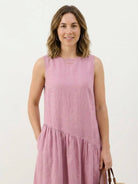 Cotton-linen summer midi dress with tiered skirt and relaxed drop-waist silhouette in natural fabric blend