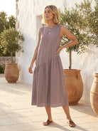 Cotton-linen summer midi dress with tiered skirt and relaxed drop-waist silhouette in lightweight fabric