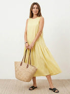 Cotton-linen summer midi dress with tiered skirt and relaxed drop-waist silhouette in khaki color