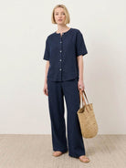 100% cotton navy blue two-piece set with button-front top and wide-leg pants