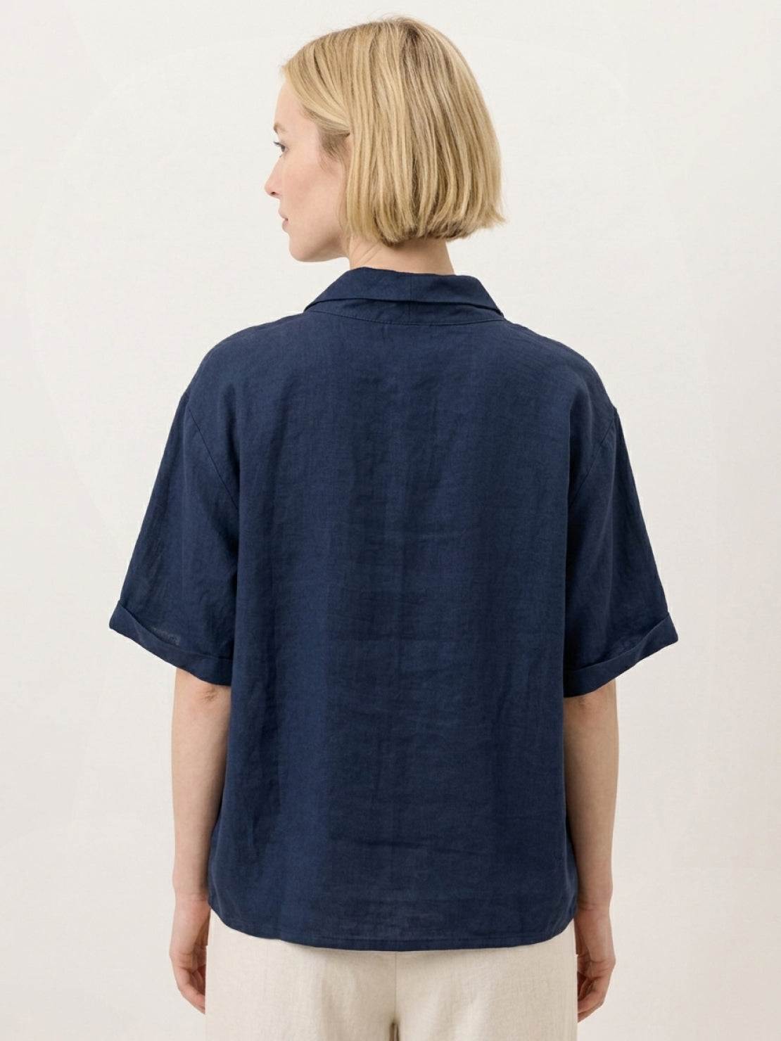 100% linen relaxed V-neck top with asymmetric button detail and short sleeves