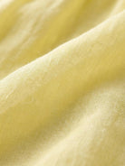 Lightweight cotton-linen summer midi dress with tiered skirt and relaxed drop-waist silhouette in soft breathable fabric