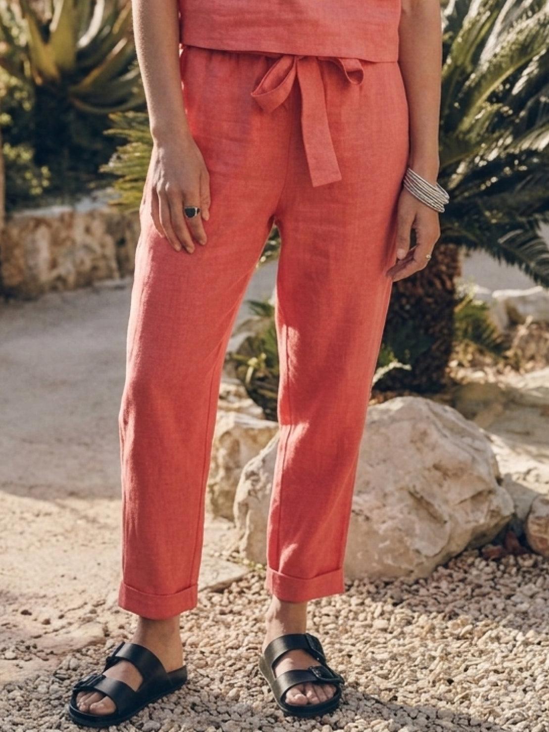 Woman wearing cotton-linen monochrome relaxed longline top and wide-leg pants set