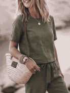 Cotton-linen two-piece set with relaxed short-sleeve top and straight-leg pants in monochrome tones