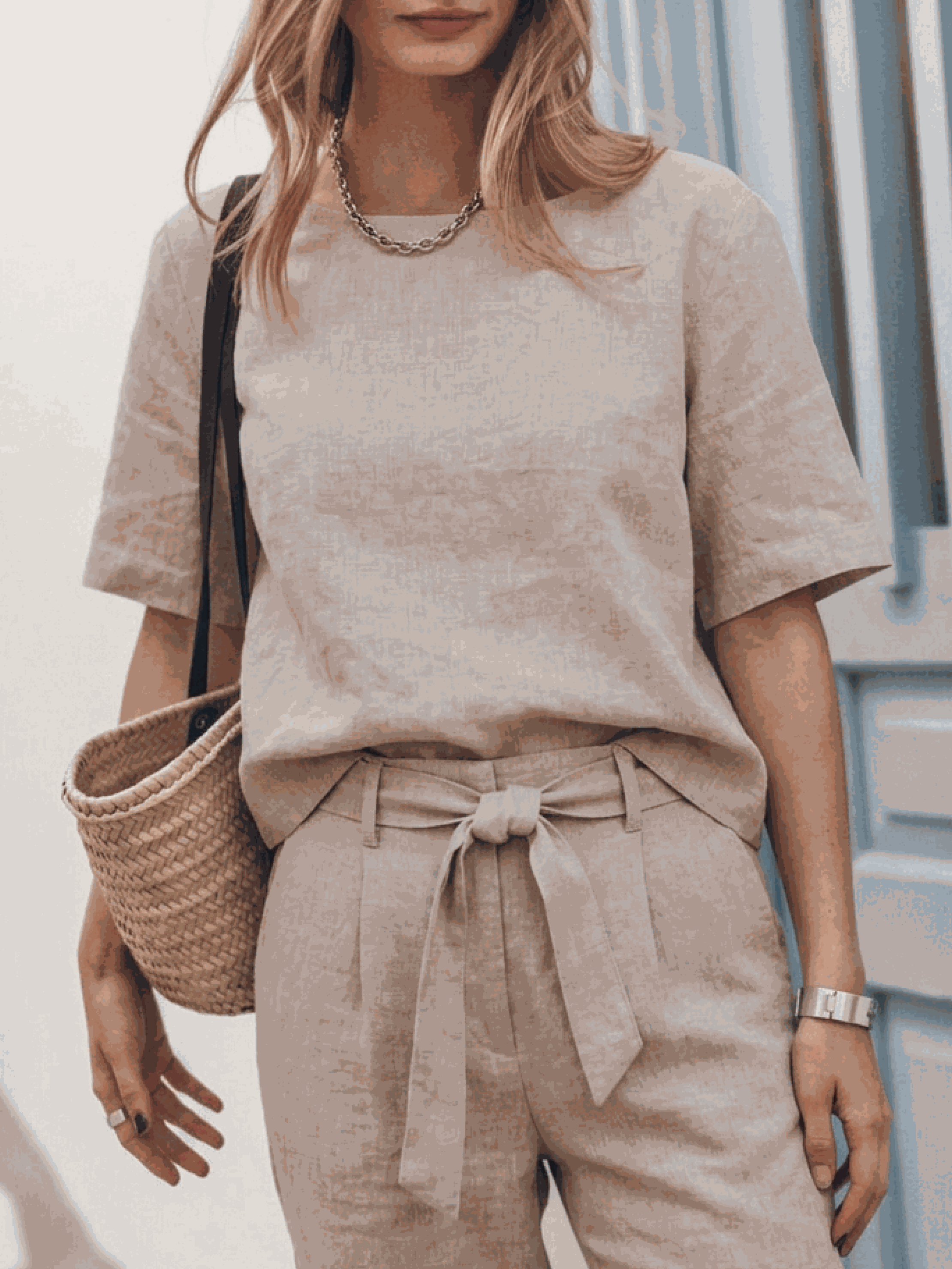 three-piece cotton-linen set with relaxed top and straight-leg pants in monochrome tones