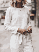 Women wearing relaxed cotton-linen set with short-sleeve top and straight-leg pants in neutral tones