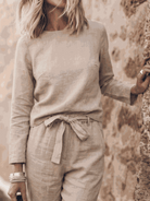 Cotton-linen two-piece set with relaxed short-sleeve top and straight-leg pants in monochrome tones