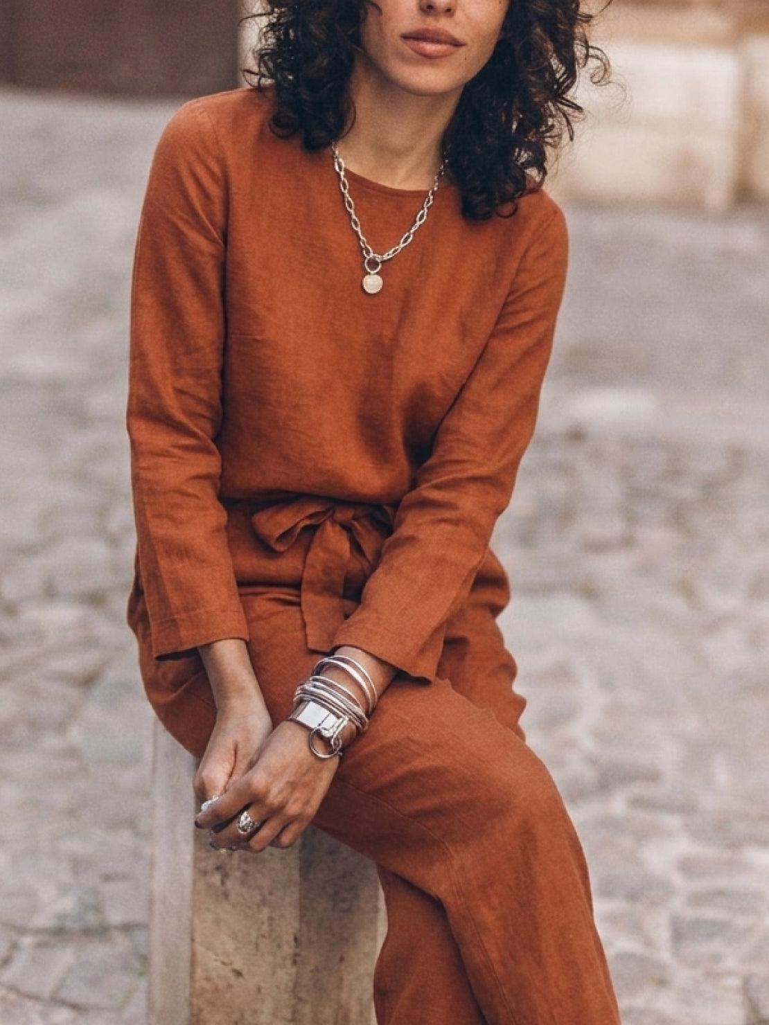 Model wearing relaxed cotton-linen monochrome longline top and wide-leg pants set