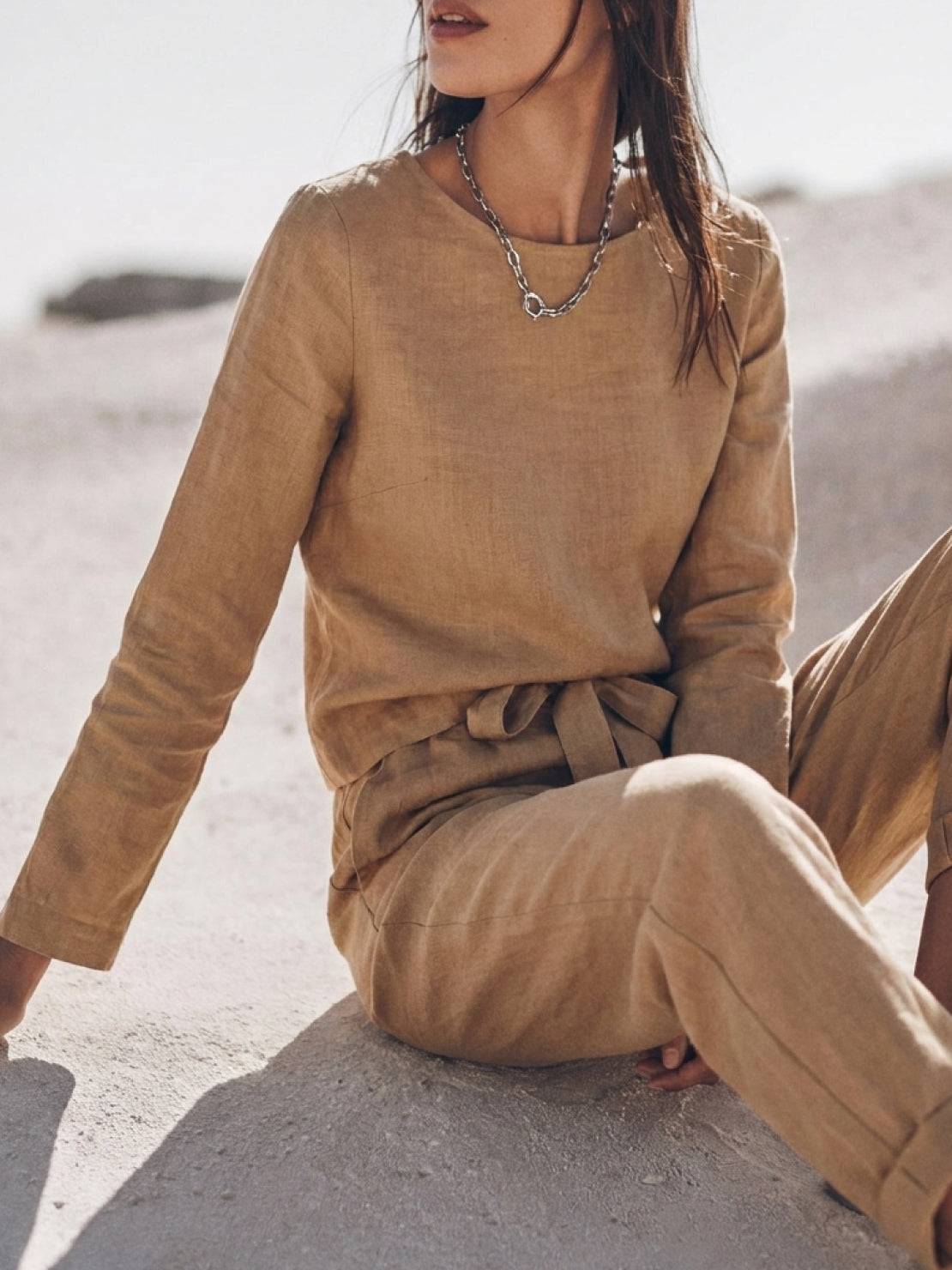 woman wearing cotton-linen monochrome relaxed longline top and wide-leg pants set