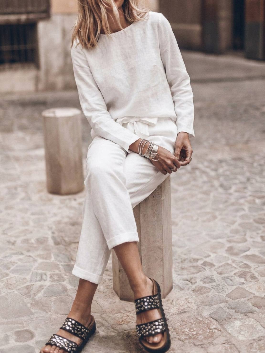 Woman wearing cotton-linen monochrome relaxed longline top and wide-leg pants set