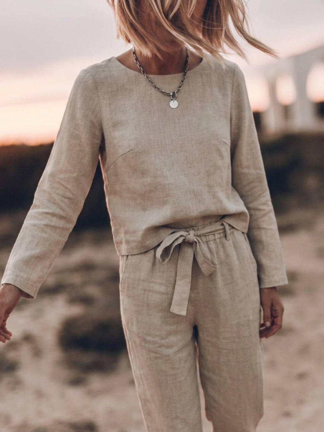 Woman wearing relaxed cotton-linen monochrome top and wide-leg pants set