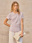100% linen rolled cuff tee with relaxed scoop neckline and contrast inner lining