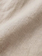 Close-up of soft, breathable pure linen fabric for age-defying shirt