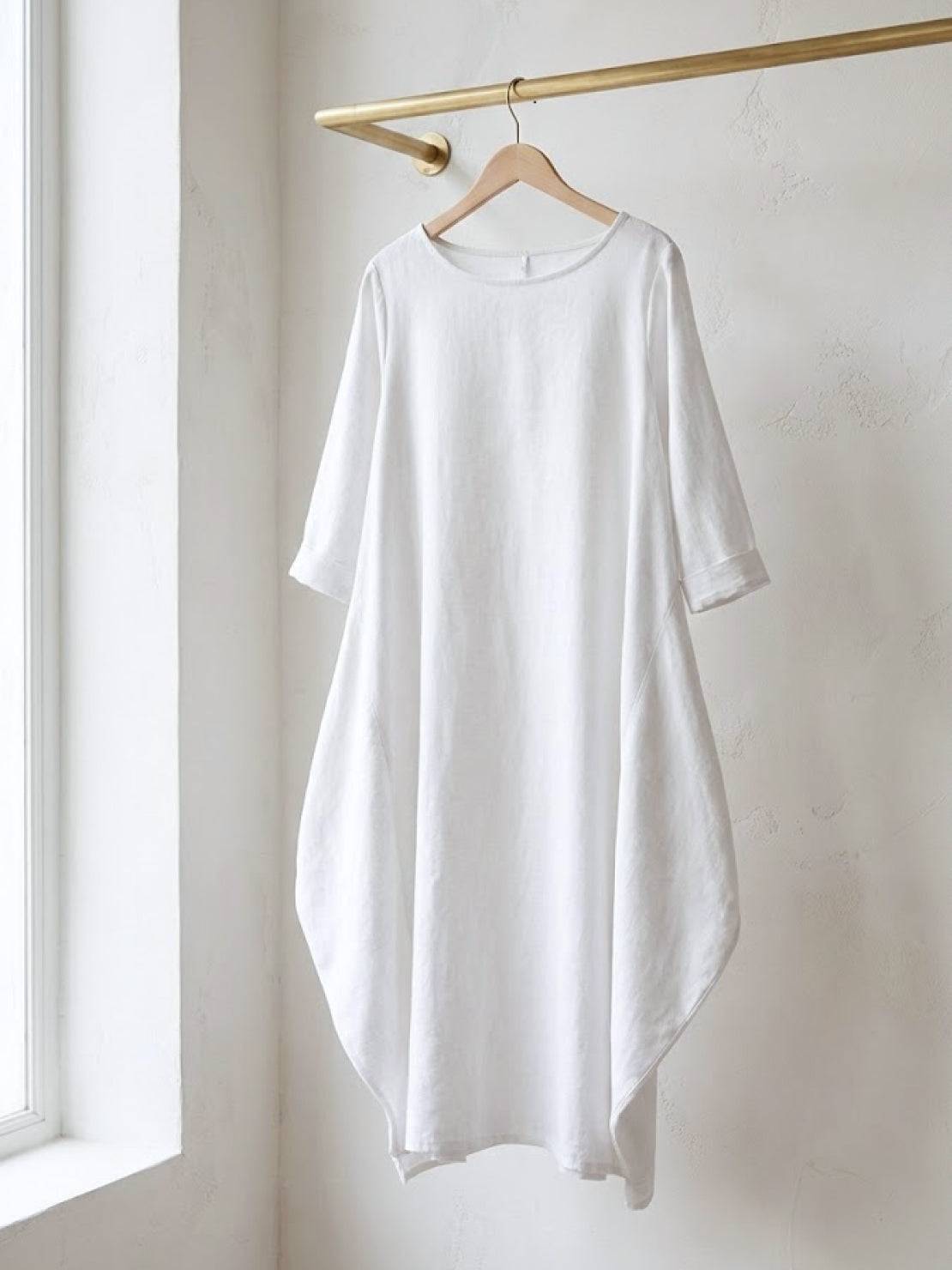Oversized bohemian maxi dress in breathable linen blend with long sleeves and loose fit